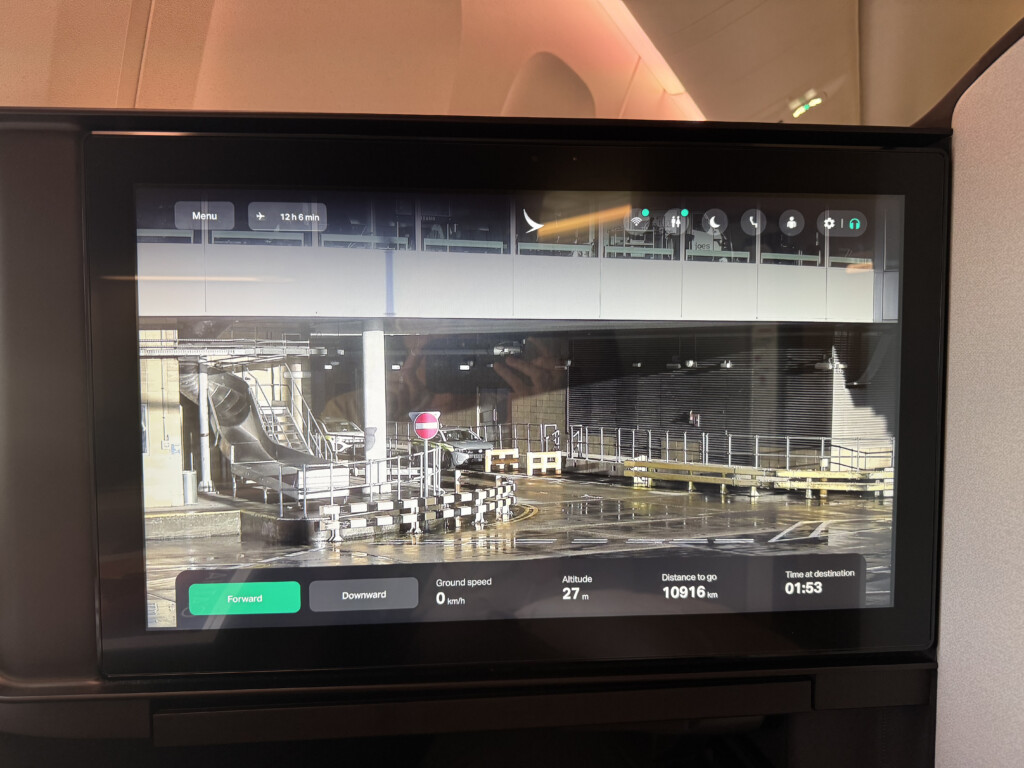a screen with a picture of an airport
