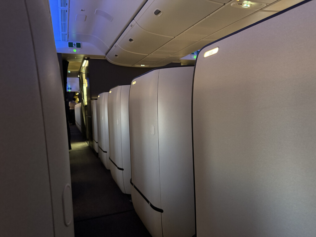 a row of white doors on a plane