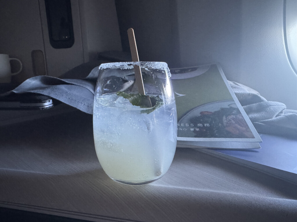 a glass with a drink in it