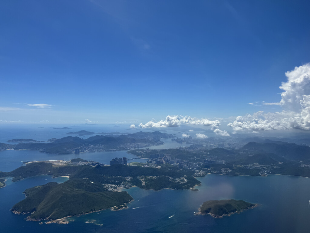 an aerial view of a city and water