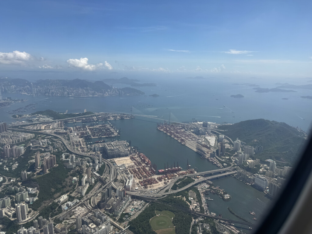 an aerial view of a city and water