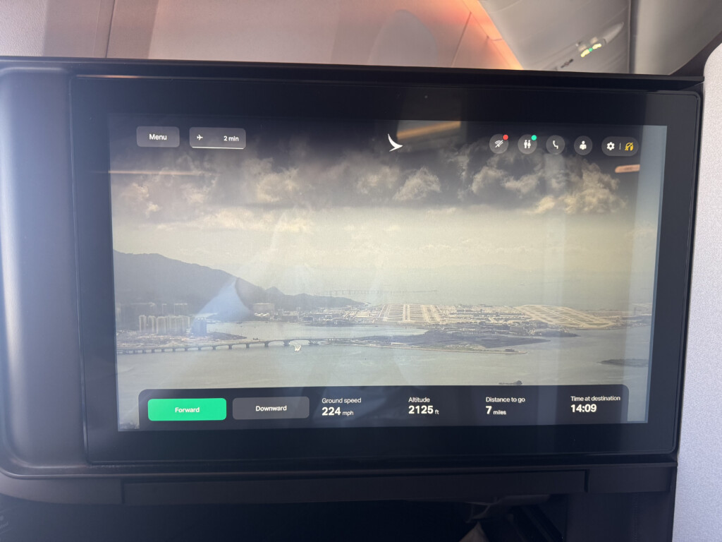 a screen with a picture of a beach and a bridge