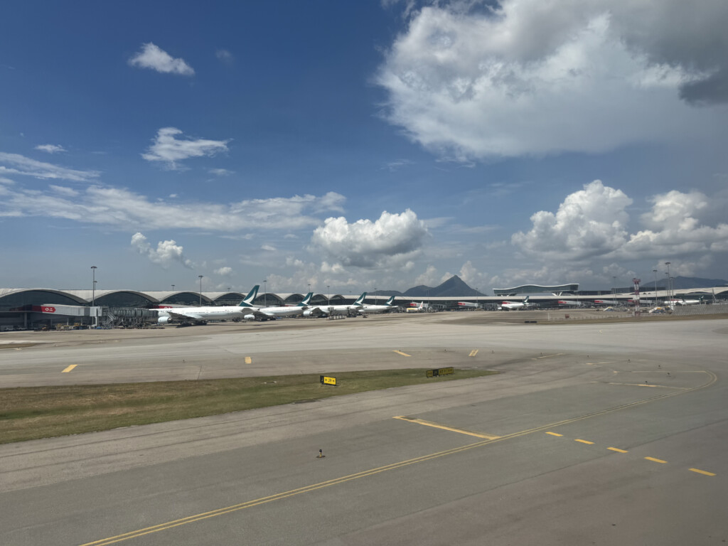 a runway with airplanes on it
