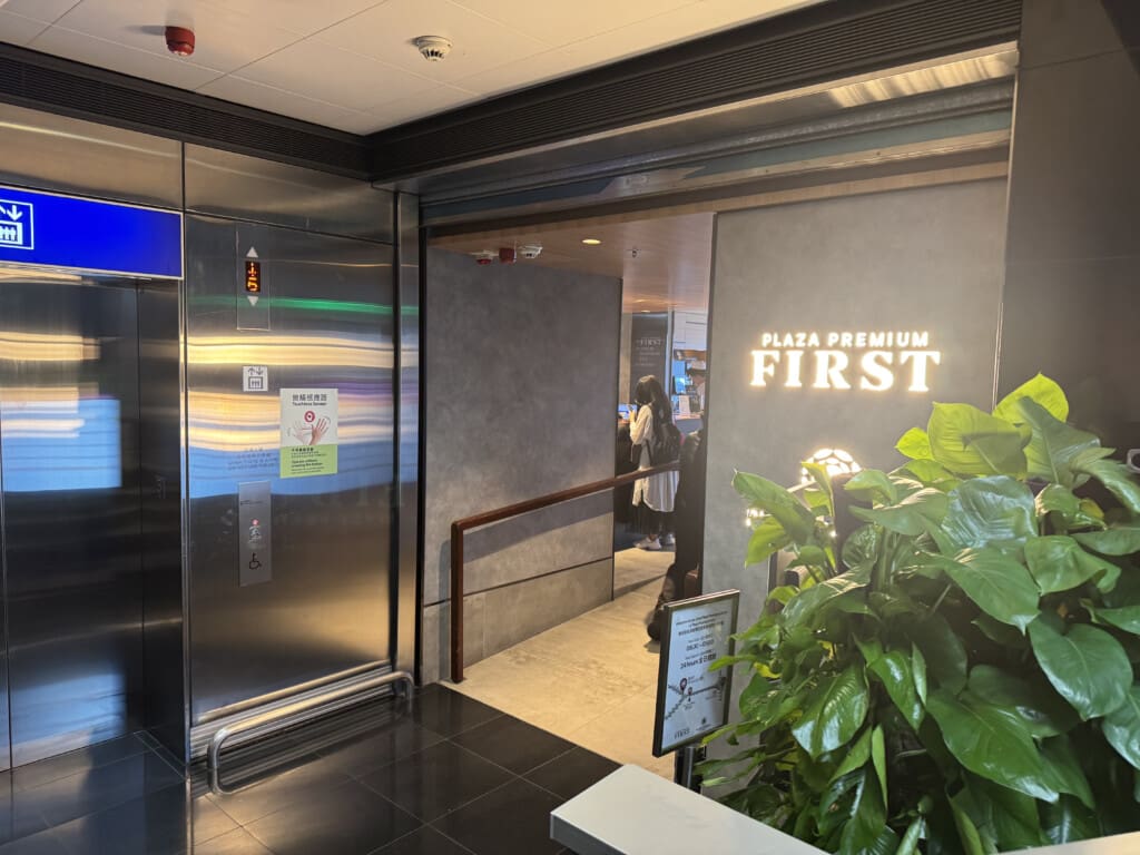 a elevator with a sign on the wall