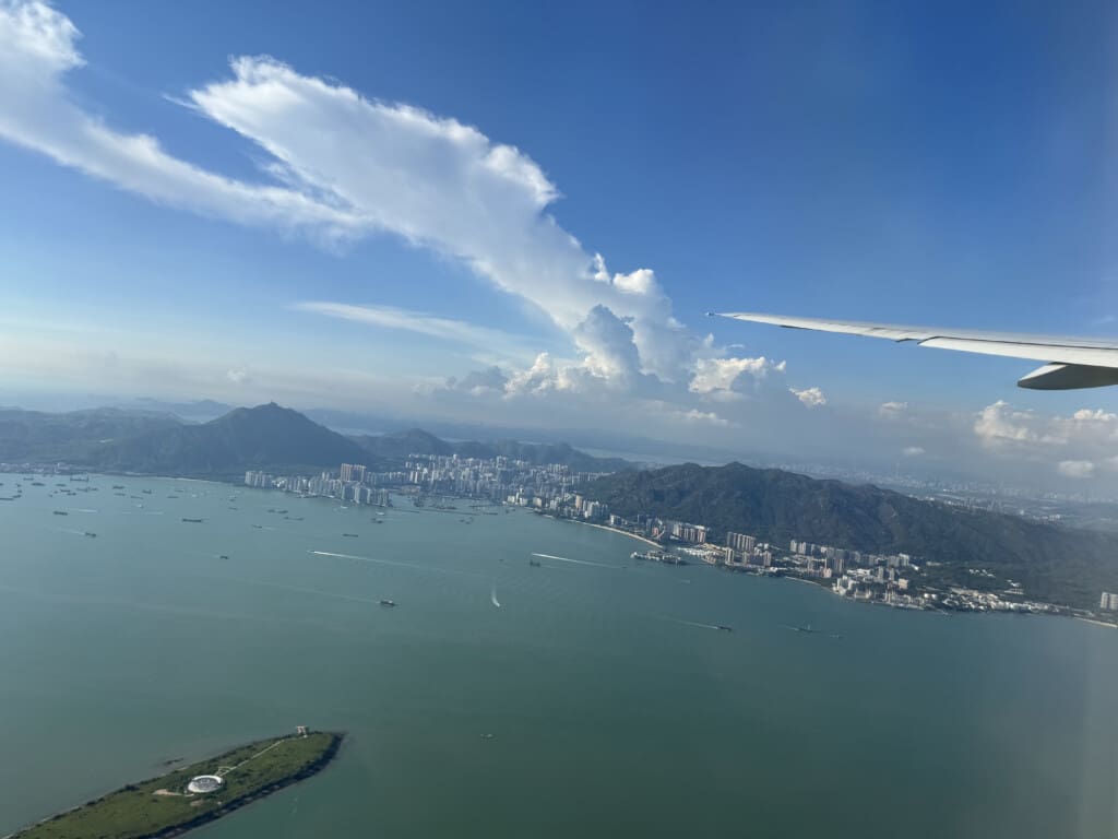 an aerial view of a city and water
