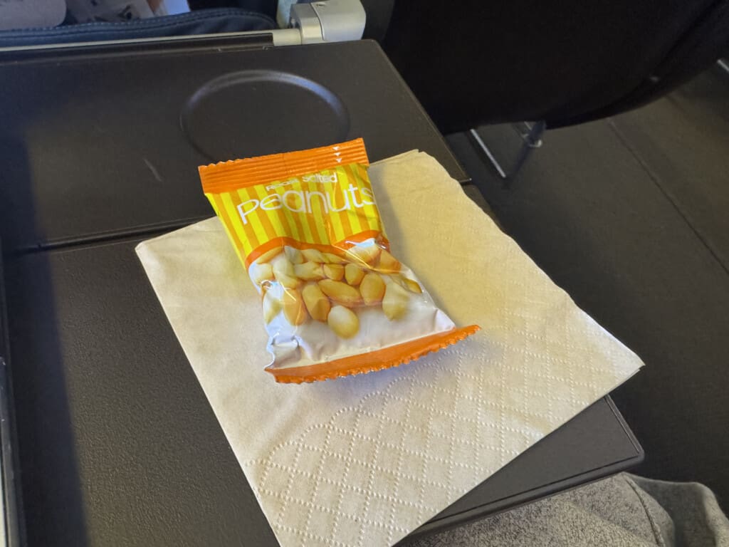 a bag of peanuts on a napkin