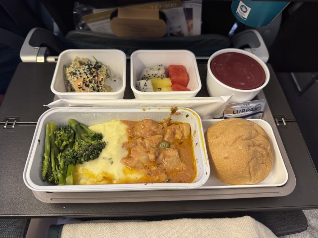 a tray of food on a plane