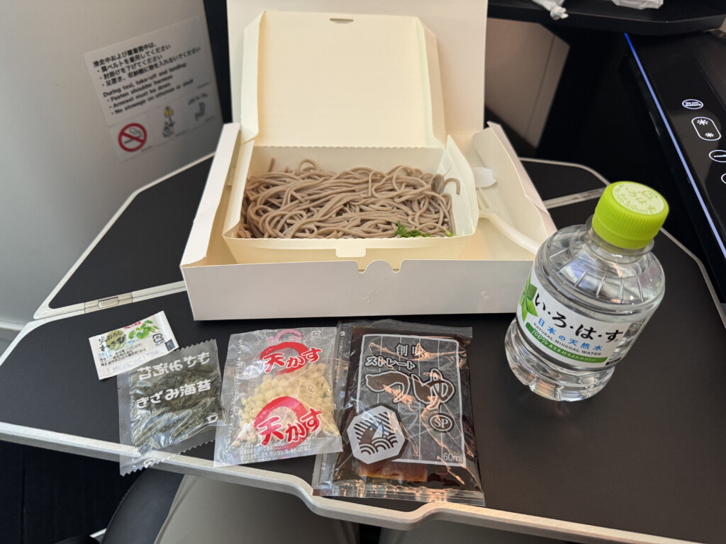 a box of noodles and a bottle of water