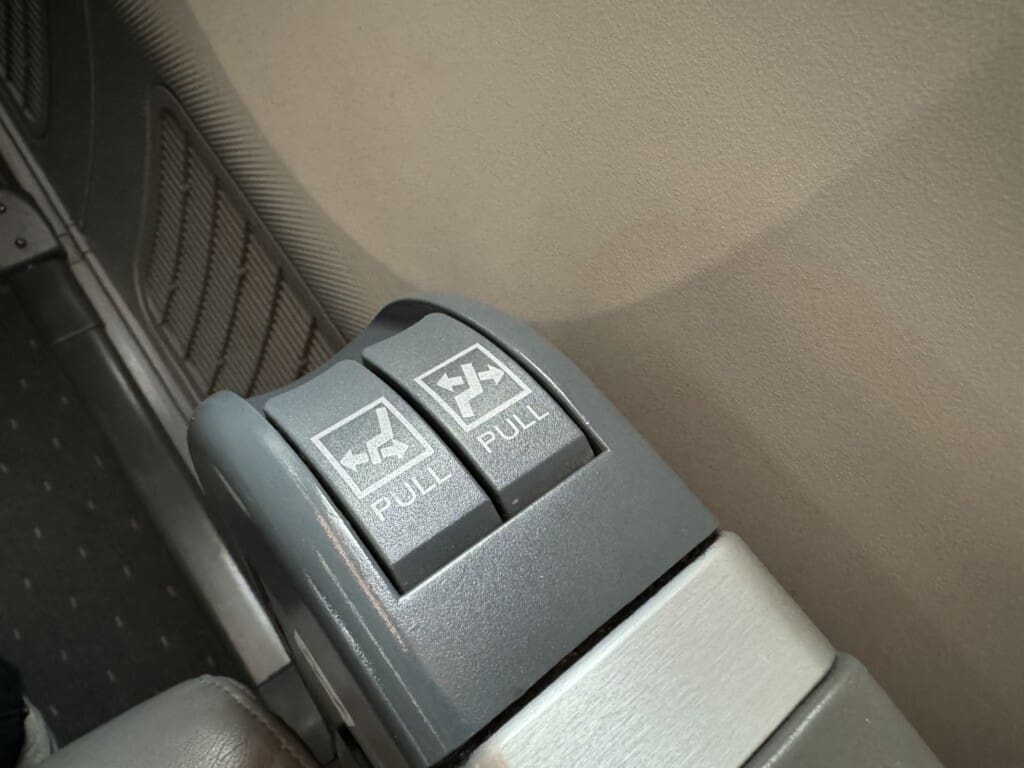 a close up of a seat belt switch