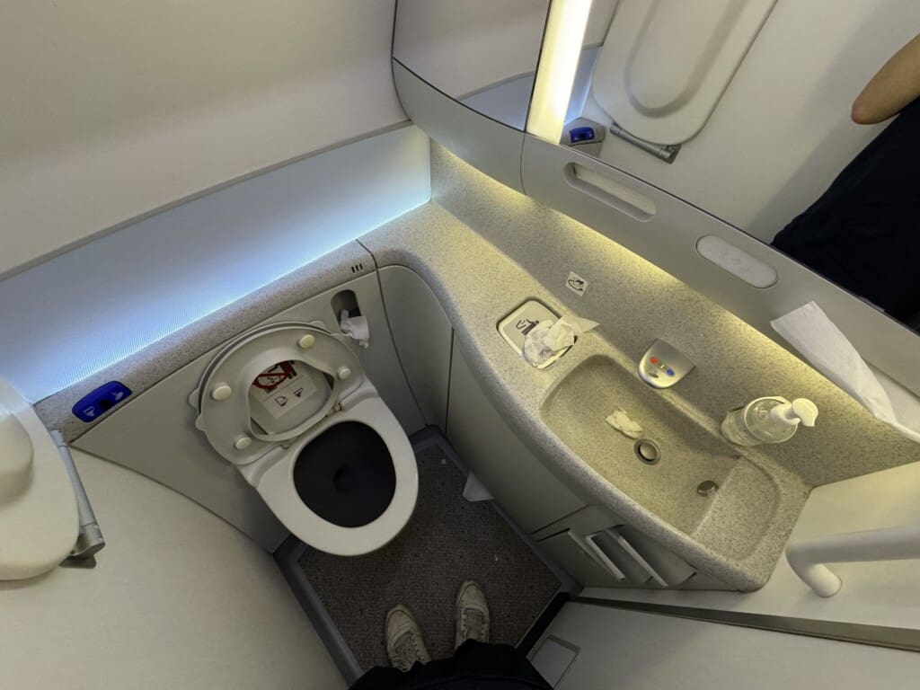 a bathroom with a sink and toilet