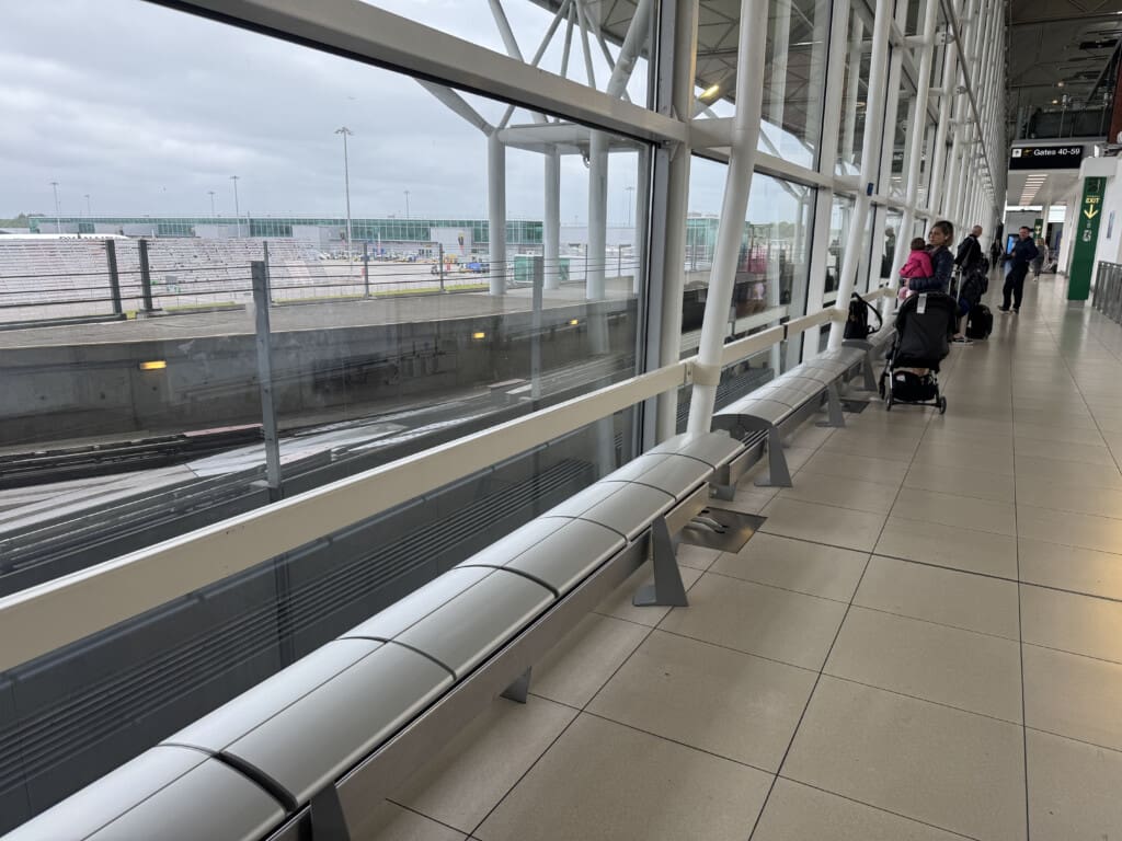 a group of people walking in an airport