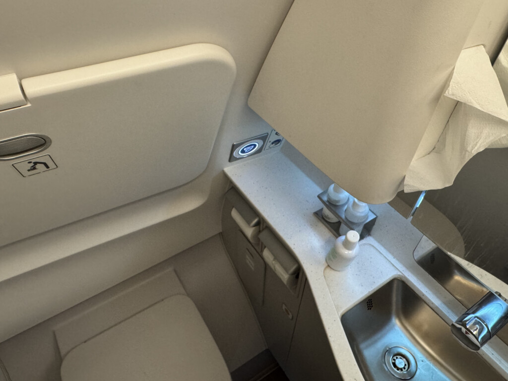 a sink and toilet in a plane