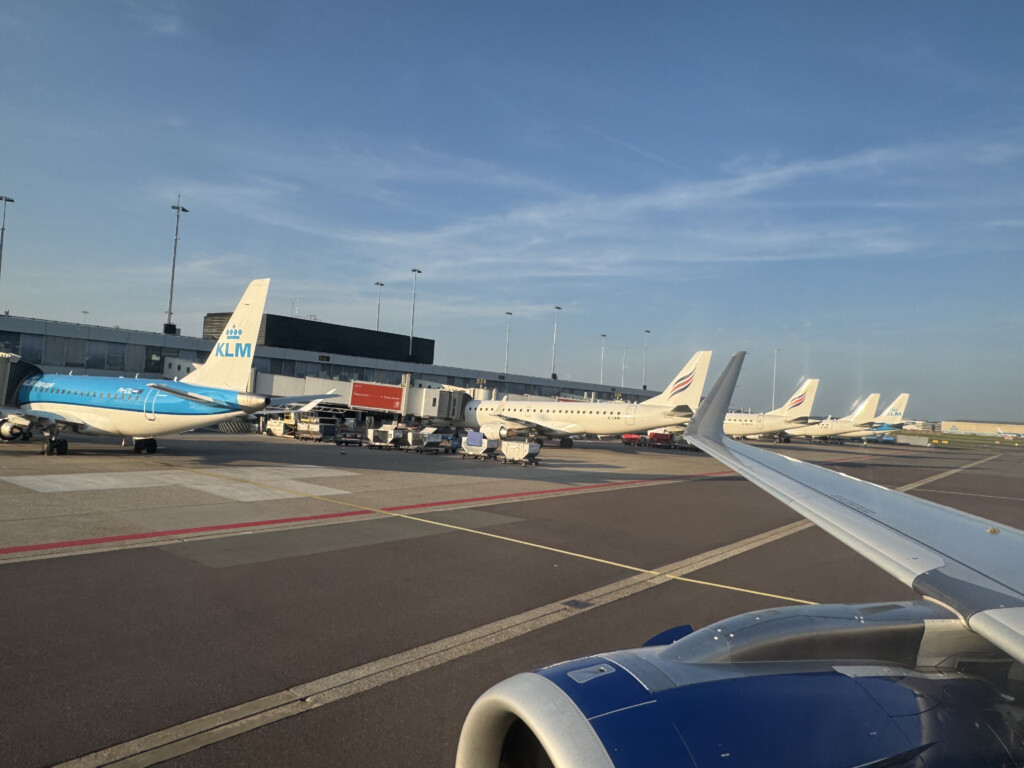 a plane wing on a runway