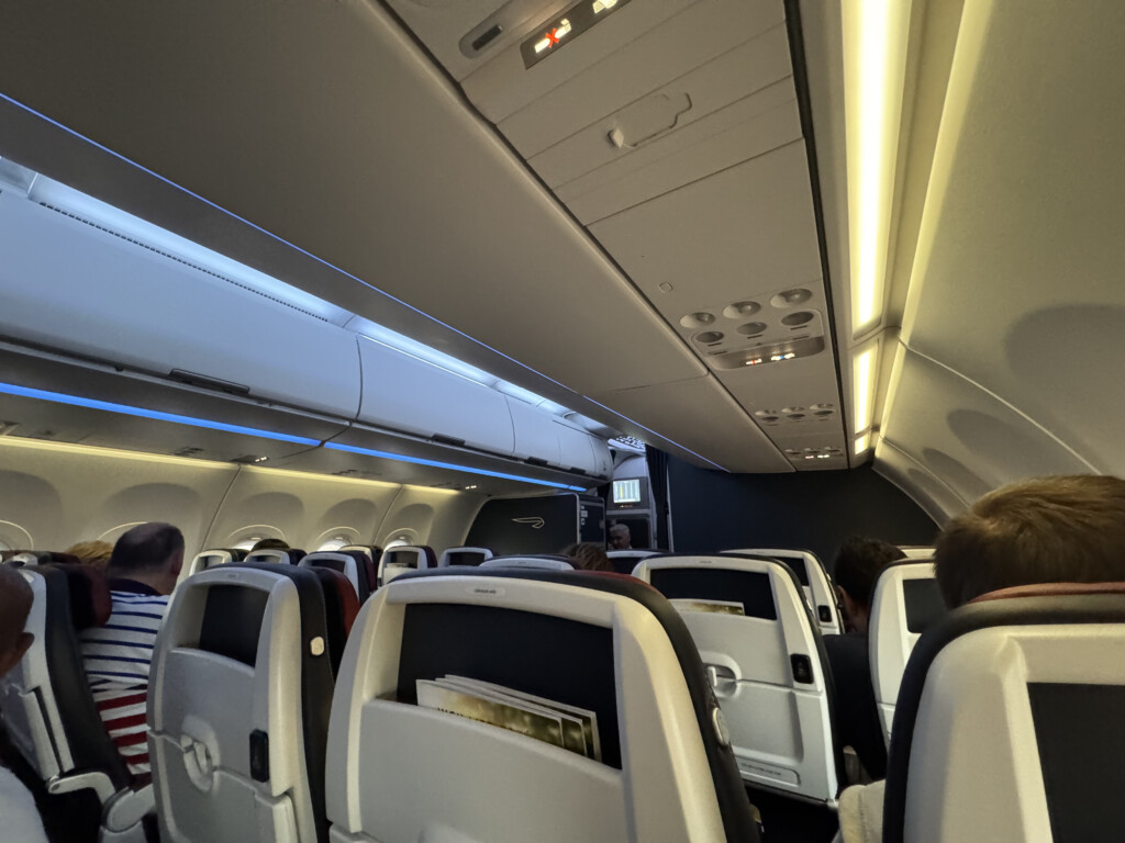 a plane with seats and lights