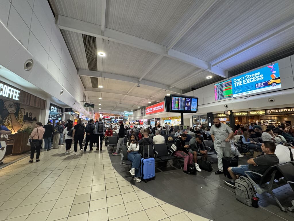 a group of people in a terminal