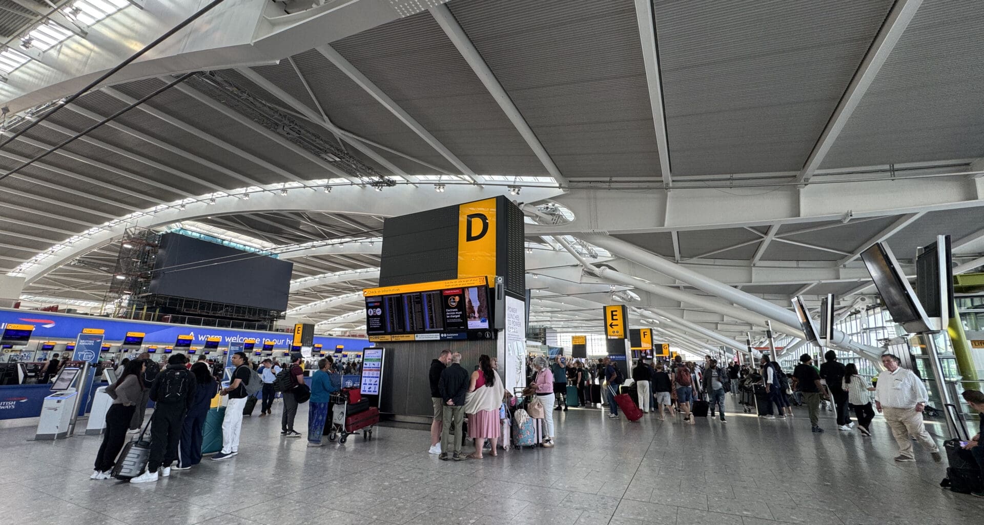 a group of people in a large airport