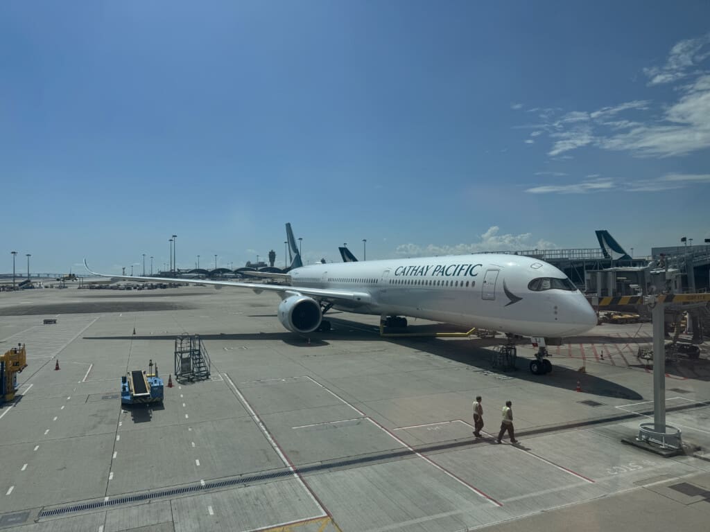 a large white airplane on a runway