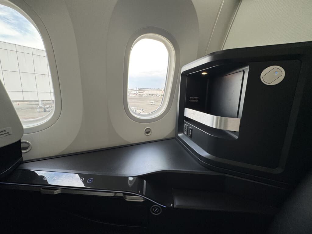 a black table with a window in the background