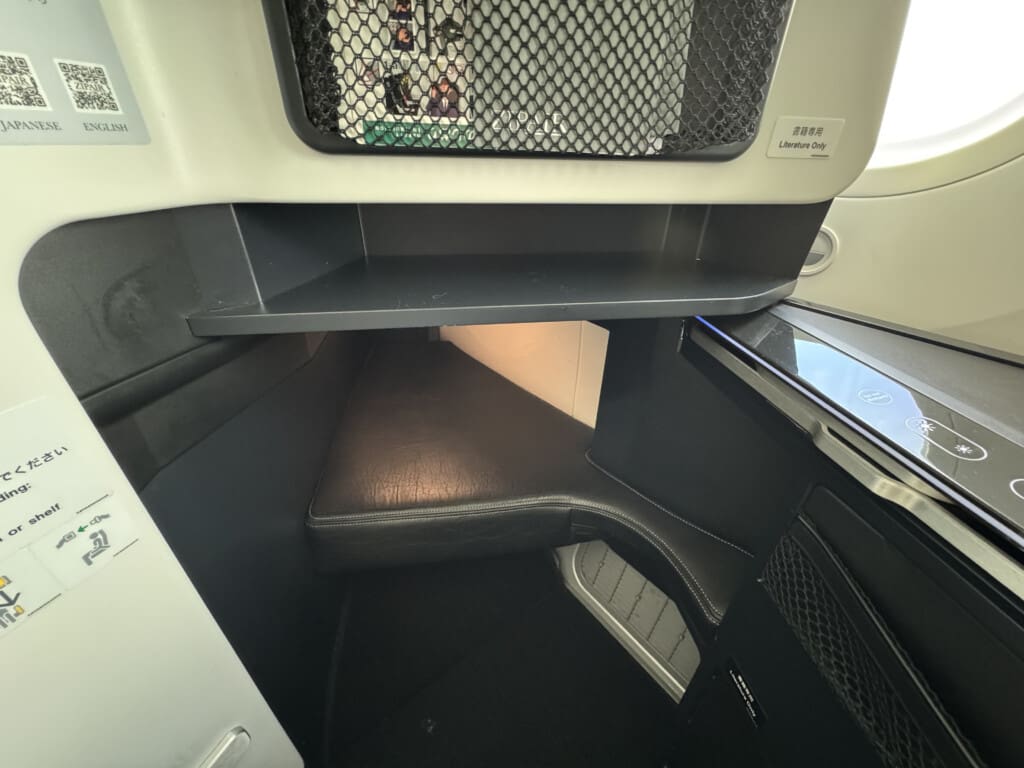 a small corner table in a plane