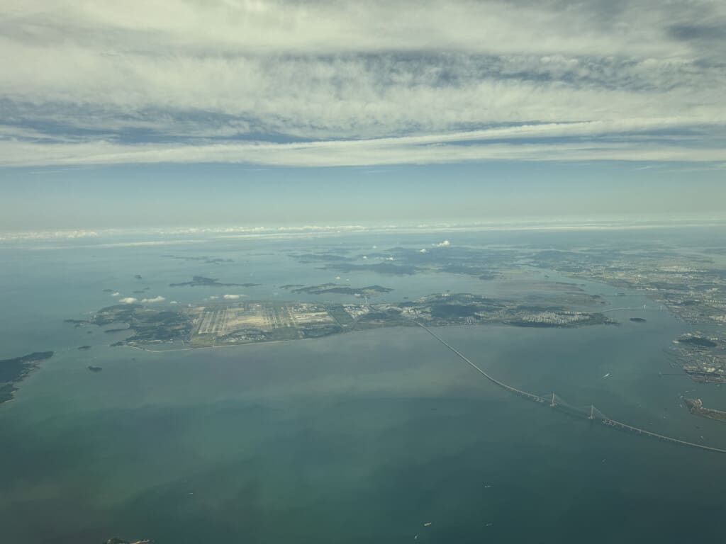 an aerial view of a city and water