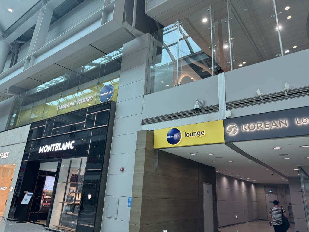 a building with glass walls and signs