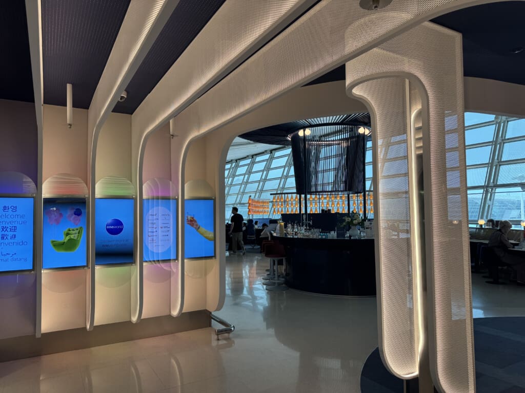a room with a large window and a large glass wall