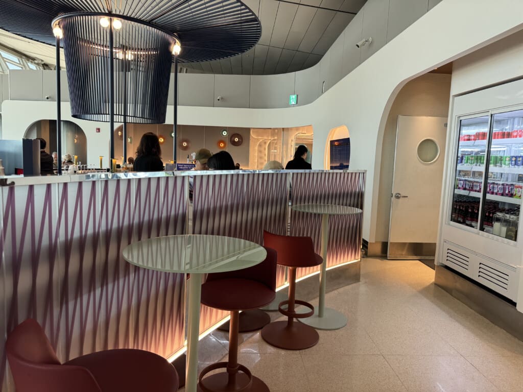 a bar with tables and chairs