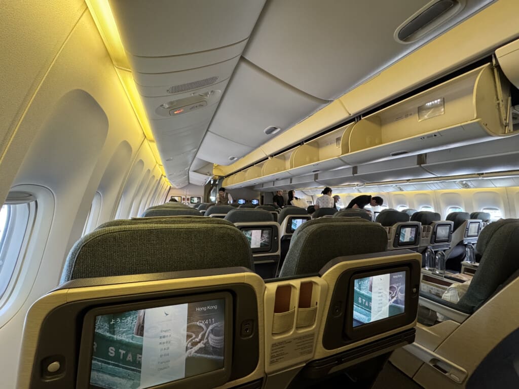 an airplane with seats and monitors