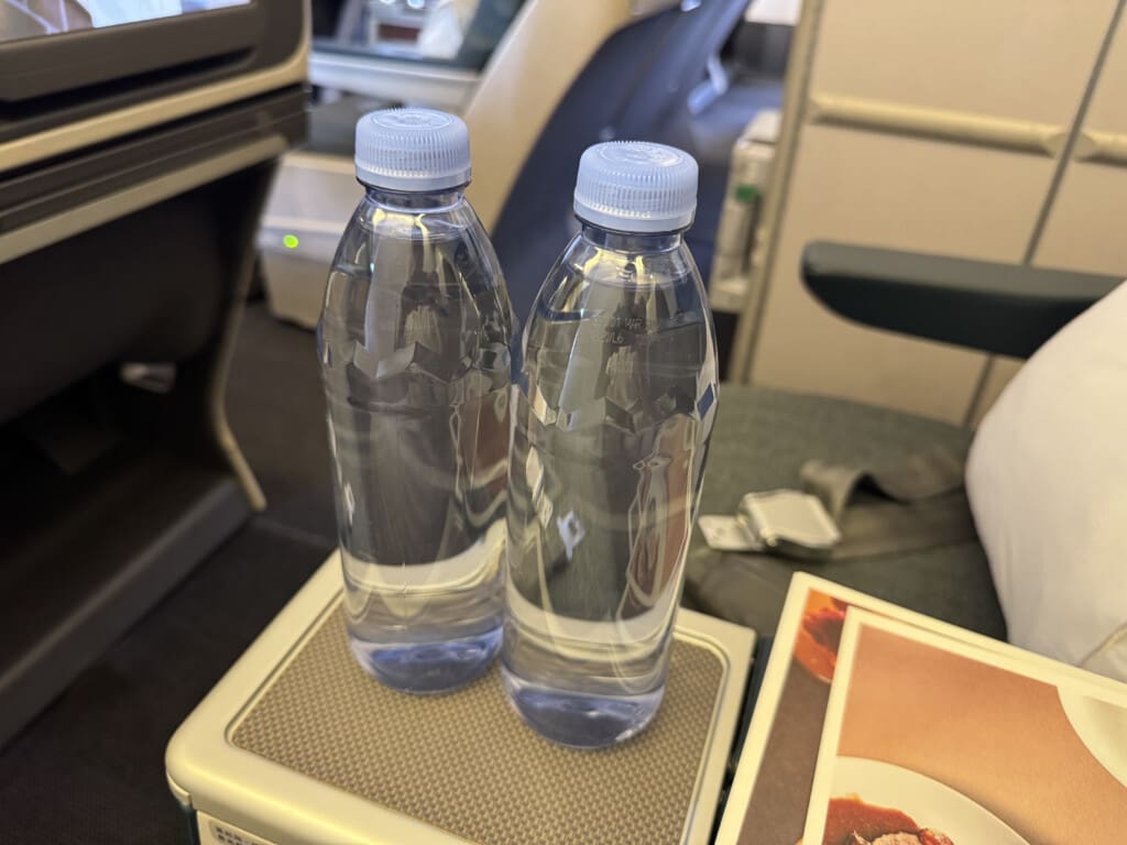 two bottles of water on a table