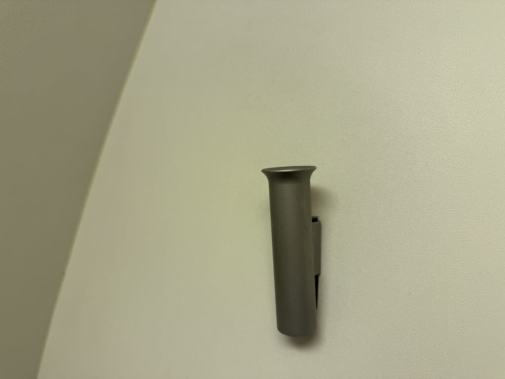 a grey object on a white surface