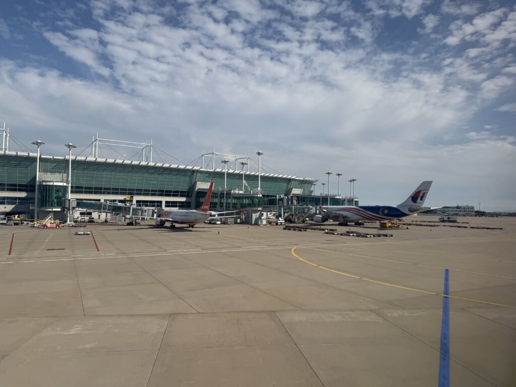 airplanes parked at an airport
