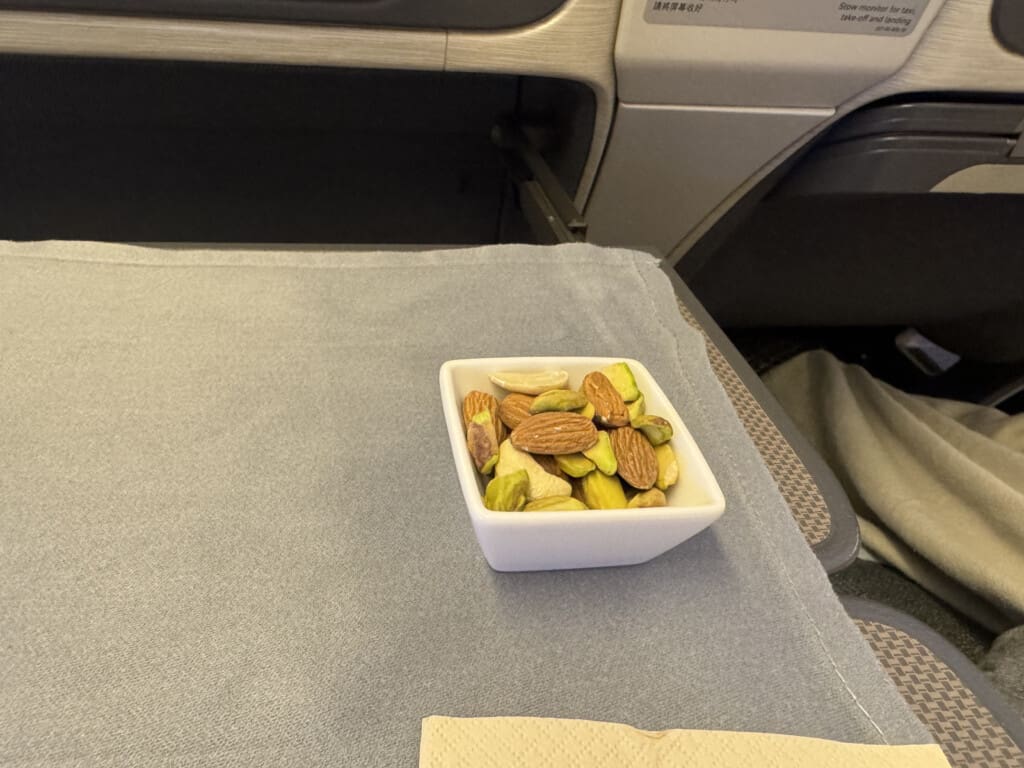 a bowl of nuts on a table