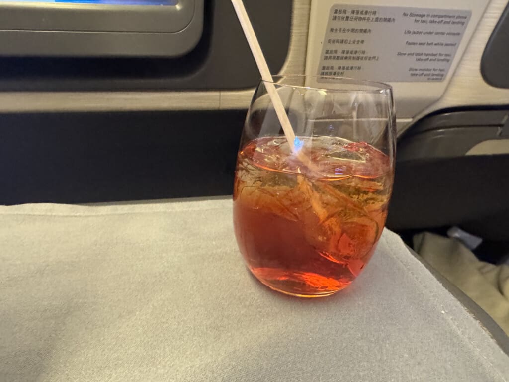a glass with a straw in it