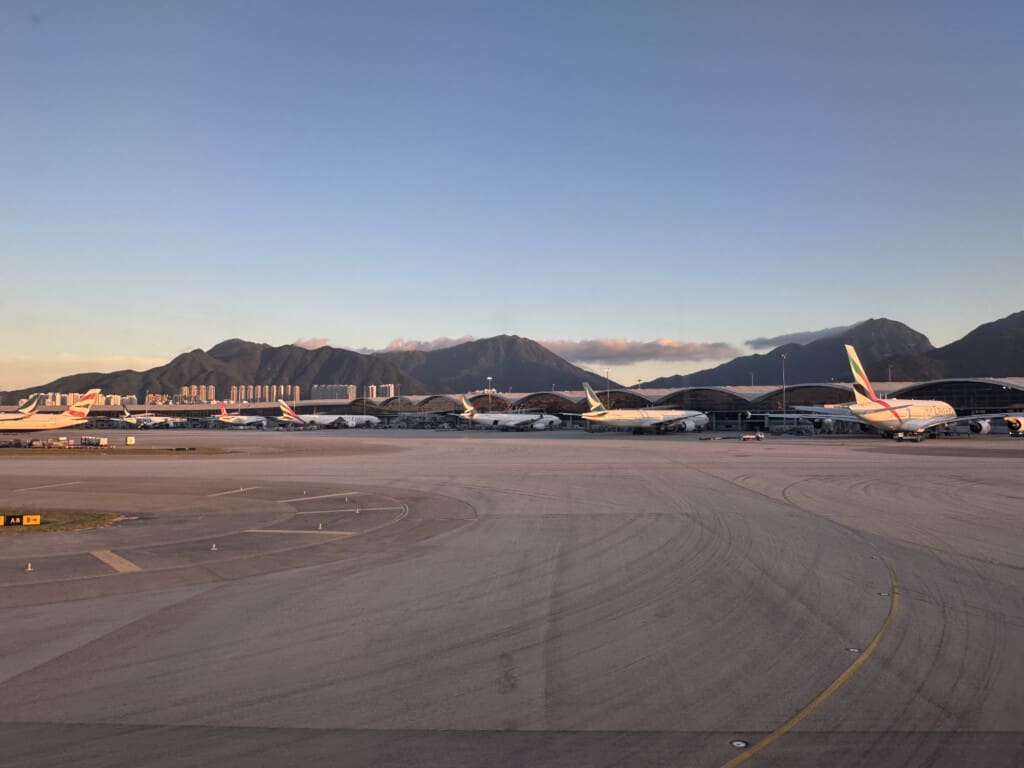 an airport with airplanes on the ground