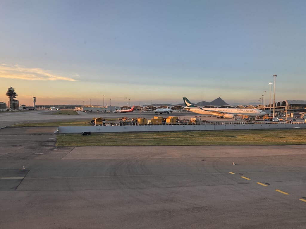 a runway with airplanes on it