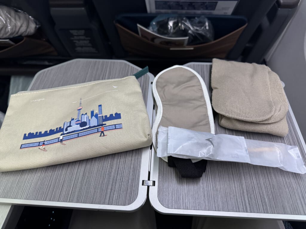 a pair of slippers and a bag on a table