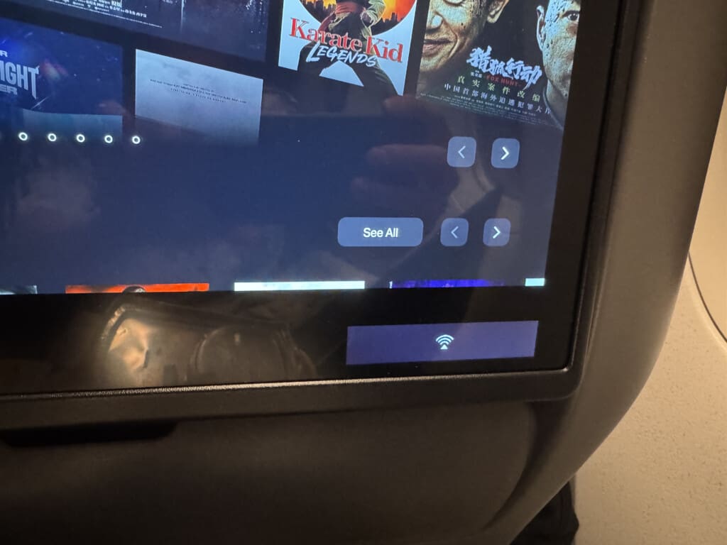 a screen with a picture of a movie on it