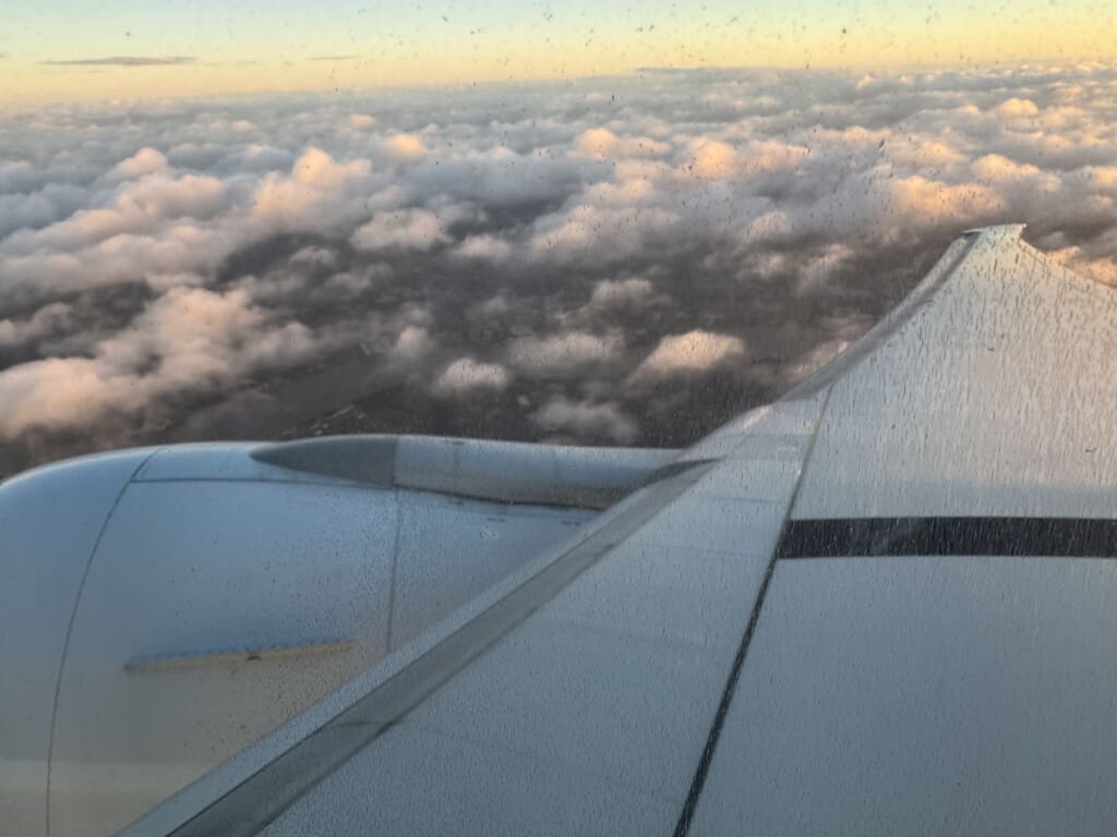a view of clouds from an airplane window