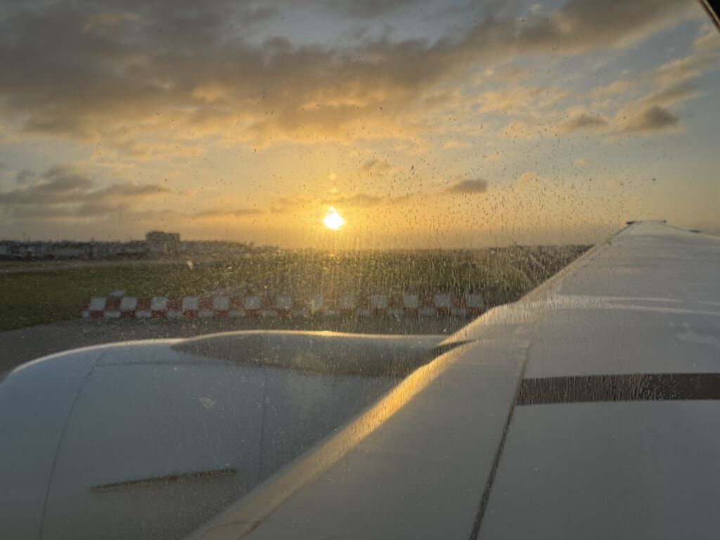 water drops on the wing of an airplane