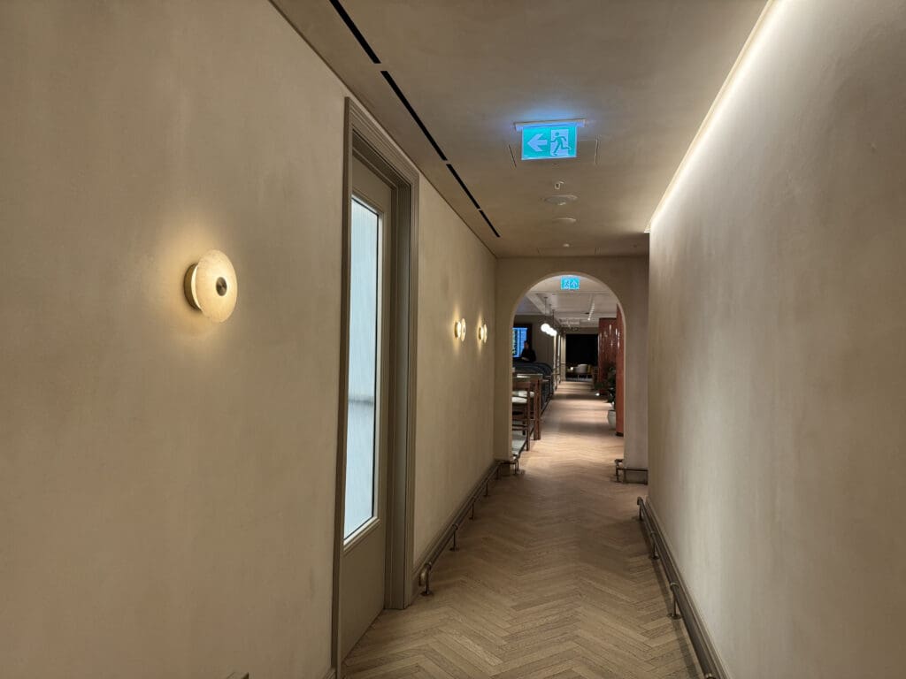 a hallway with a light on the ceiling