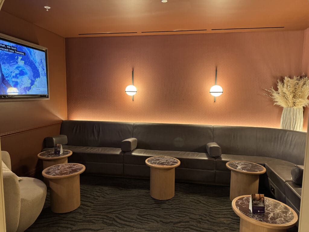 a room with couches and tables