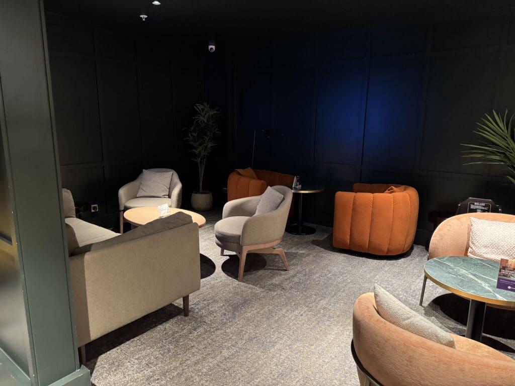 a room with chairs and tables