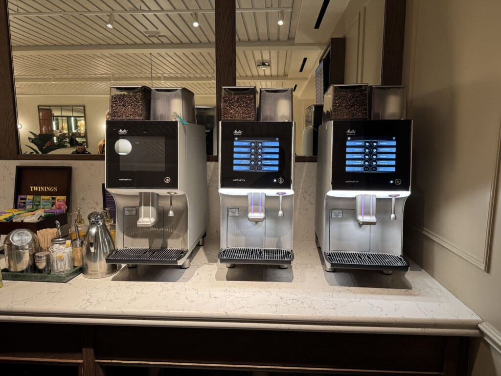 a group of coffee machines on a counter
