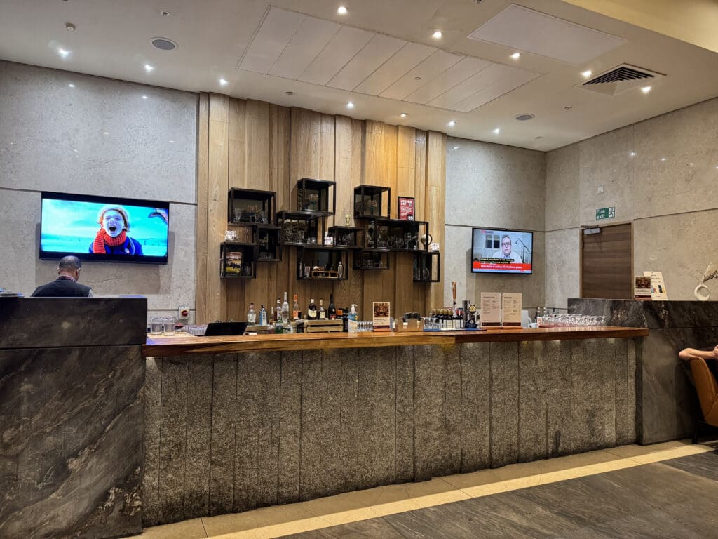 a bar with bottles on the counter