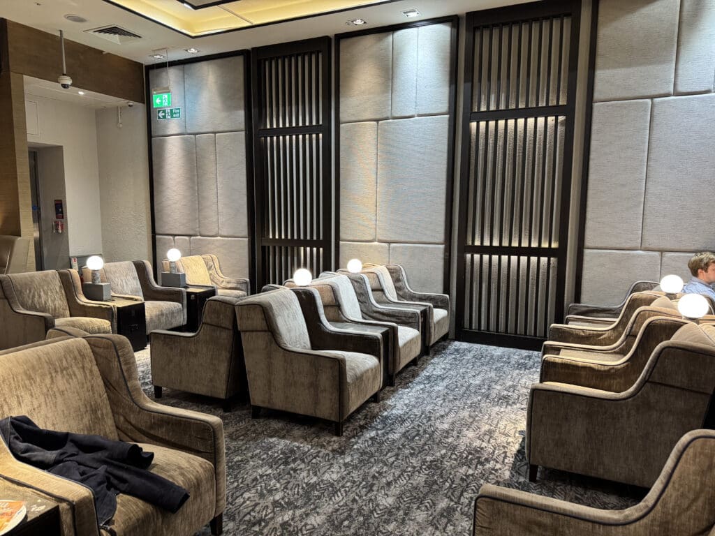 a room with chairs and a wall