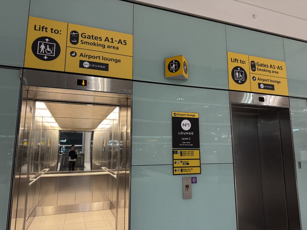 an elevator with signs on it