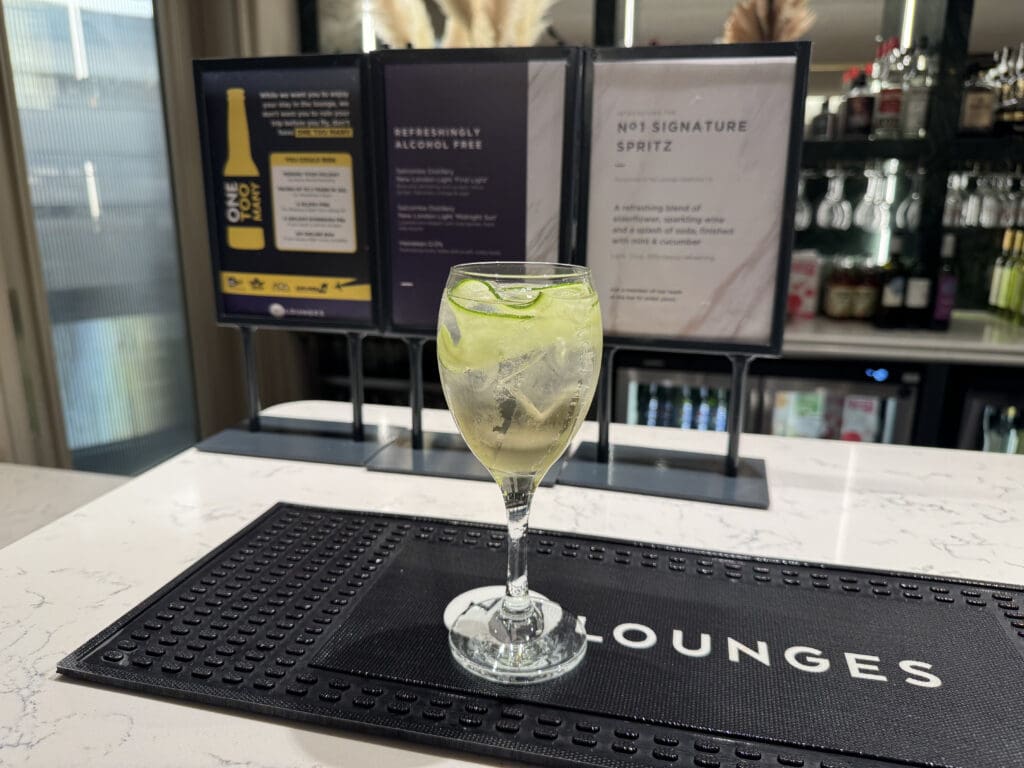 a glass of liquid on a table