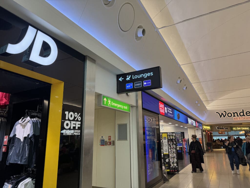 a group of signs in a mall