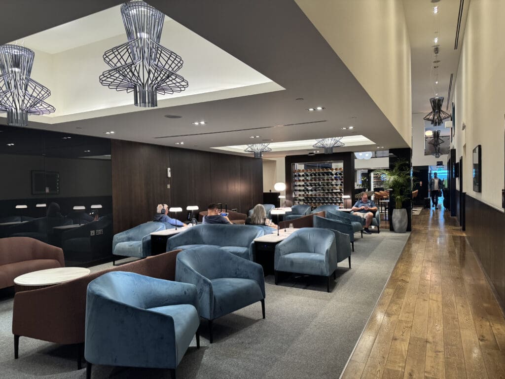 a room with blue chairs and tables