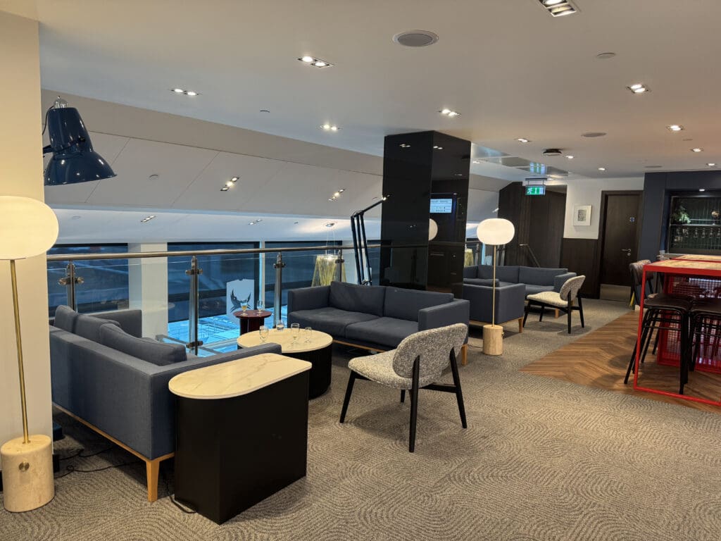 a room with couches and chairs